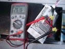Step Four :: Disconnect the red and black battery leads which plug into red + and black - on the pc board. Place the red voltmeter lead into the yellow connector plug on the RED battery lead, and the black voltmeter lead into the yellow connector plug on the BLACK battery lead. Read the voltage, it should be between 24 and 27 volts. Be sure the battery is charged before this test.