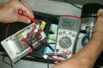 Step Three :: Set your voltmeter to DC. Place your red voltmeter lead into red motor lead, same for the black leads.